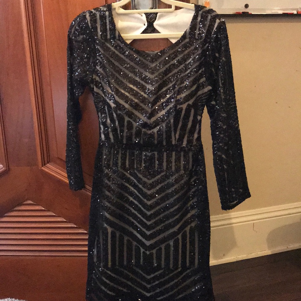 A black sparkly dress